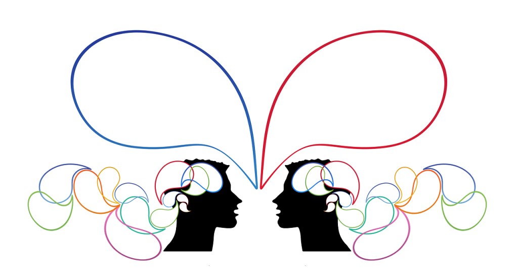 Two silhouetted heads face one another with colorful thought/talk bubbles flow around and above them. 